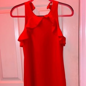 A coral colored dress